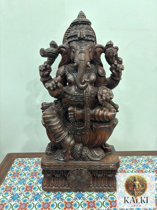 Divine Ganesha Seated Sculpture (Hand-Carved Wooden Idol)