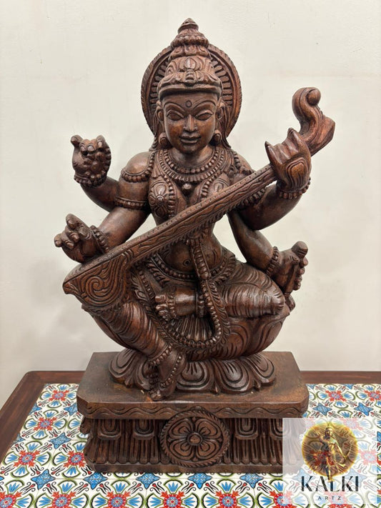 Divine Saraswati Veena Sculpture (Hand-Carved Wooden Idol)