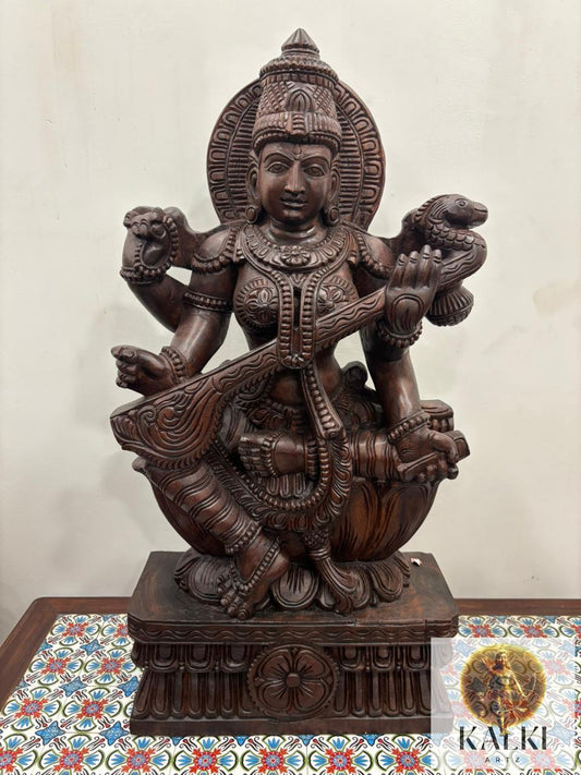 Divine Saraswati Veena Sculpture (Hand-Carved Wooden Idol)